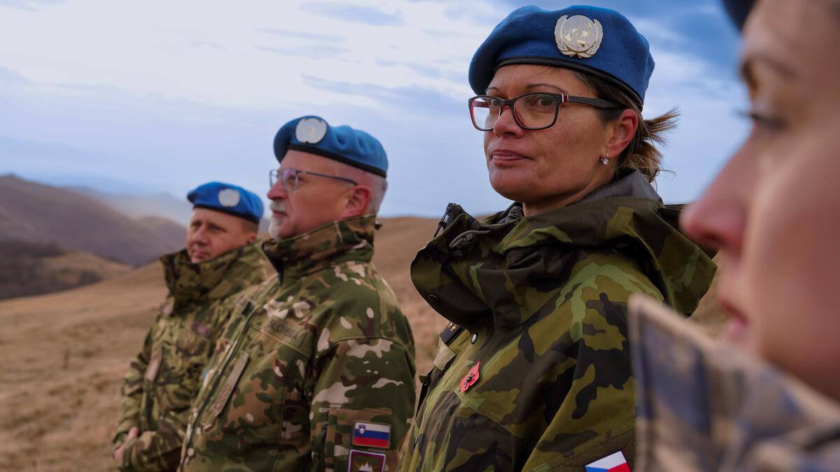peacekeepers standing in a field