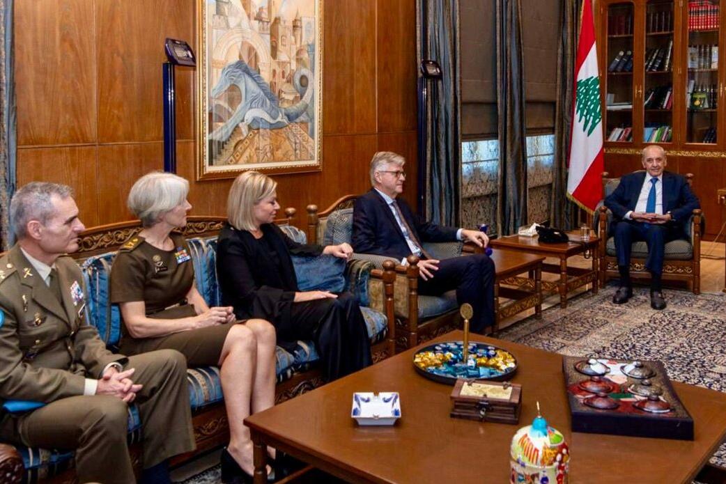 High level representatives attend a meeting.